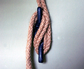 Cast iron cleat hook with jute cord