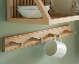 Four peg shaker peg rail available with natural or painted white finish