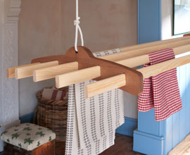 The Arthur clothes airer set in a woodland cottage style setting