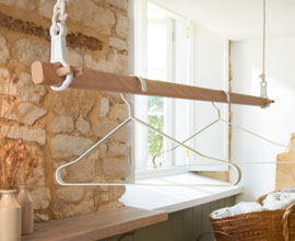 Pulley operated hanging clothes rail with cast iron brackets and heavy duty beech lath